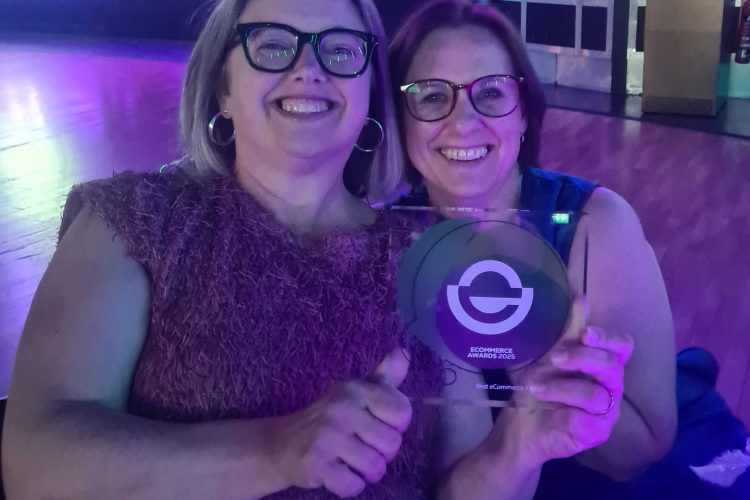 Sarah and Tina winning an award